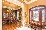 Grand foyer opens to formal dining room at 7097 Old Southwick in Wynlakes, Montgomery, AL. Professional photos and tour by Go2REasssistant.com