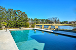 View of pool, 17th hole and lake on golf course at 7641 Lakeridge Drive in Wynlakes, Montgomery, AL. I Shoot Houses...Professional photos and tour by Sherry Waktins at Go2REasssistant.com