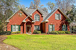 Front view at 8048 Mossy Oak Drive in Eastern Forest, Montgomery, AL. I Shoot Houses...Professional photos and tour by Sherry Watkins at Go2REasssistant.com