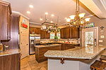 Kitchen with stainles steel appliances at 8100 Wyndridge Drive, Montgomery, AL. Professional photos and tour by Go2REasssistant.com