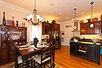 Kitchen and dining areas at 92 Chapel Hill, Lucas Point at The Waters, Pike Road, AL. Professional photos and tour by Go2REasssistant.com