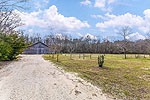 Barn with horse stalls at Prairie Place, Historic Estate, Hope Hull, AL. Professional photos and tour by Go2REasssistant.com