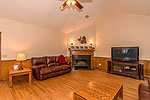 Grand living room with fireplace view of 984 Muskgokee Trail, Tallassee, AL. Professional photos and tour by Go2REasssistant.com