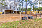 1 of several open sheds at 984 Muskgokee Trail, Tallassee, AL. Professional photos and tour by Go2REasssistant.com