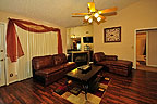 Living Room with corner fireplace at 106 Blushing Groom in Taylor Crossing, Montgomery, AL. Professional photos and tour by Go2REasssistant.com