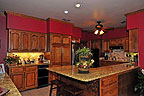 Kitchen with breakfast nook and tons of cabinet and counter space at 6202 Henley Way in Henley Hedge, Montgomery, AL. Professional photos and tour by Go2REasssistant.com