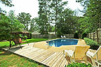 Sparkling pool and deck at 84 Hickory Lane, Emerald Mountain, Wetumpka, AL. Professional photos and tour by Go2REasssistant.com