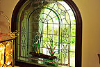 Stained glass over front door at 136 Oaks Point, Jacksons Gap, AL on beautiful Lake Martin. Professional photos and tour by Go2REasssistant.com