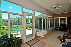 Bright Sunroom overlooks patio and yard at 8617 Pebble Creek in Sturbridge,  Montgomery,  AL. Professional photos and tour by Go2REasssistant.com
