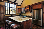 Grand kitchen with breakfast island at 268 Ridgeview Point, The Ridge, AL. Professional photos and tour by Go2REasssistant.com