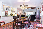 Dining Room with wetbar and built-in cabinetry at historic Rose Hill Plantation 1949 Cottage, Montgomery, AL. Professional photos and tour by Go2REasssistant.com