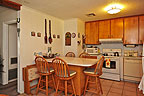 Kitchen with breakfast bar at 5748 Roxboro, Montgomery, AL. Professional photos and tour by Go2REasssistant.com