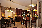 Breakfast nook and kitchen at 9749 Silver Bell Ct, Pike Road, AL. Professional photos and tour by Go2REasssistant.com