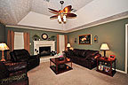 Great room with fireplace at 7150 White Oak Lane in Copperfield, Montgomery,  AL. Professional photos and tour by Go2REasssistant.com