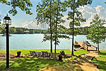 Lakeside rock patio at 421 Windy Wood, Windermere West, Lake Martin, Alexander City, AL. Professional photography and tour by Sherry Watkins, Go2REassistant.com