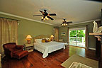 Master suite with private access to deck and fabulous lake views at 1875 Windermere West, Lake Martin - Alexander City, AL. Professional photos and tour by Go2REasssistant.com