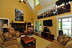 Greatroom with fireplace and spectacular lake views at 1875 Windermere West, Lake Martin - Alexander City, AL. Professional photos and tour by Go2REasssistant.com